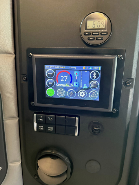 CustomAir touchscreen climate controller installed in truck cab — K&C Auto Electrics air conditioning